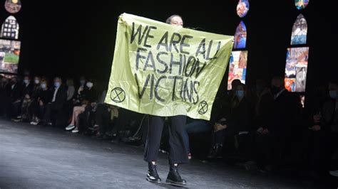 Protester Crashes Dior's Spring 2021 Paris Fashion Week 